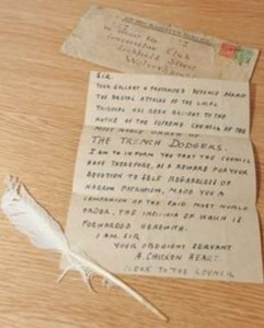 white feather with letter